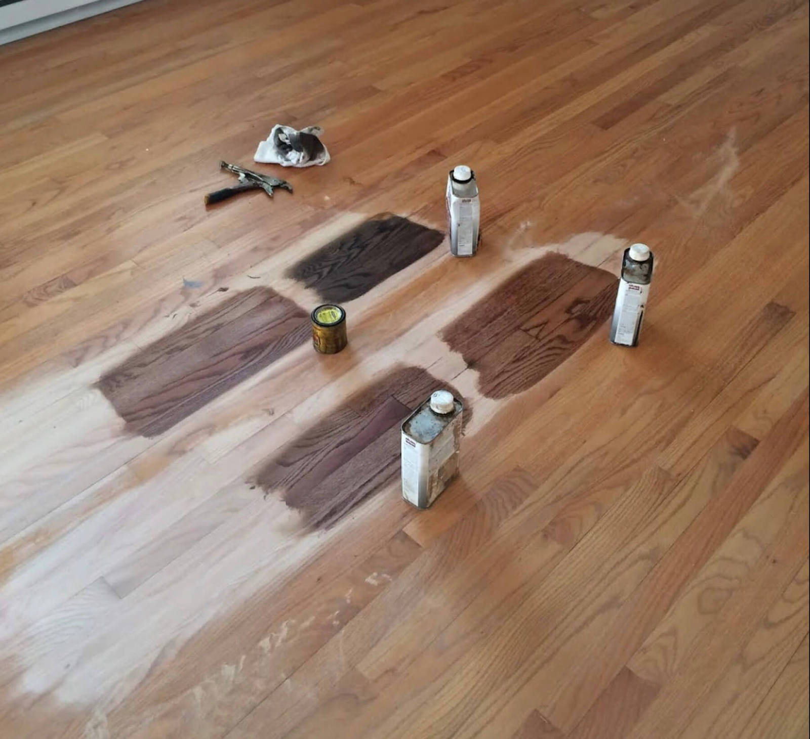 a few stain color choices shown on a hardwood floor in huntsville, al